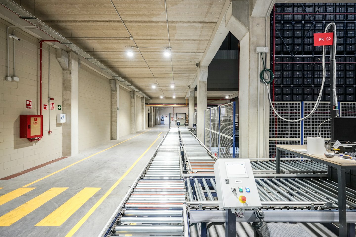 Automated conveyor system in a modern industrial storage facility.